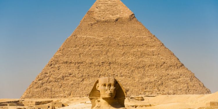 The Great Sphinx aligned perfectly center of the Pyramid of Khafre in Giza, Cairo, Egypt
