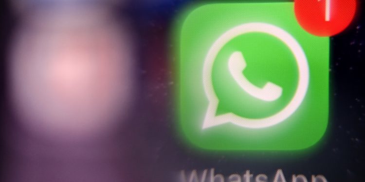 A picture taken on March 23, 2022 in Moscow shows the US instant messaging software Whatsapp logo on a smartphone screen. (Photo by AFP)